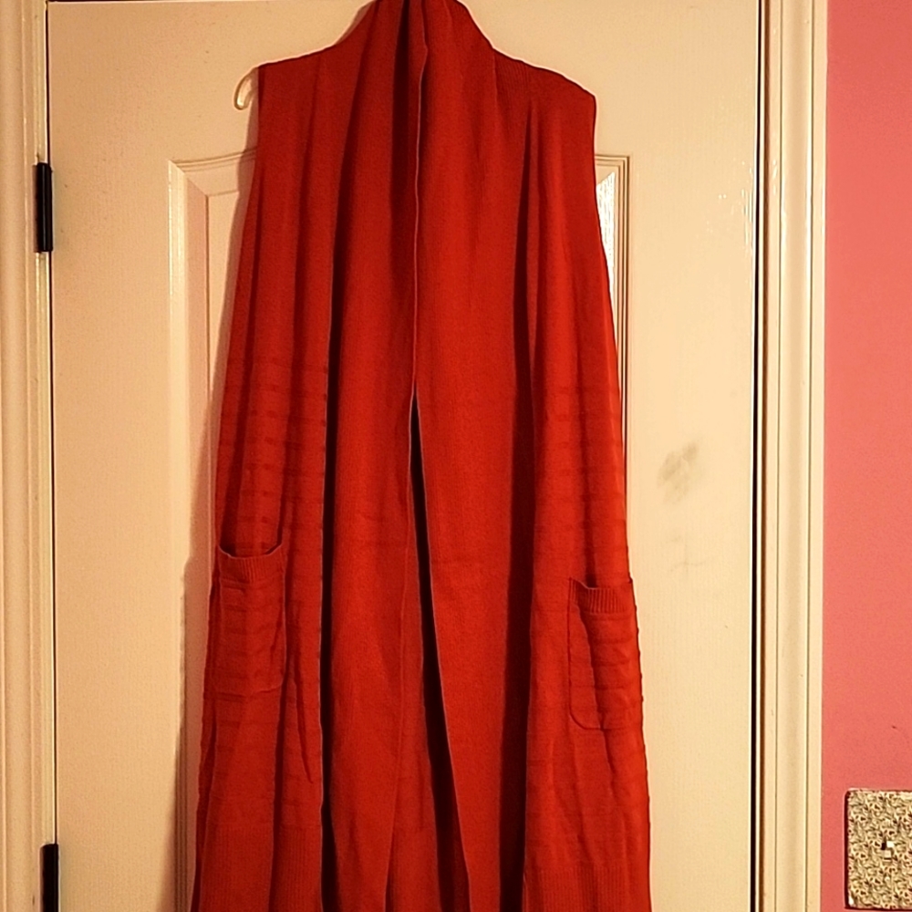 Mid Length Sweater Cardigan Vest, best of all, it has POCKETS on both sides.